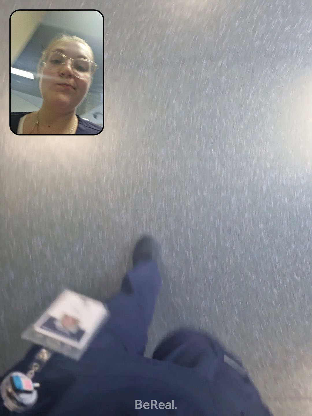 A screen grab of a video of feet walking on the linoleum floor of a hospital hallway, inset is a photo of Siobhan's face and she is frowning as she rushes to where she is meant to be.