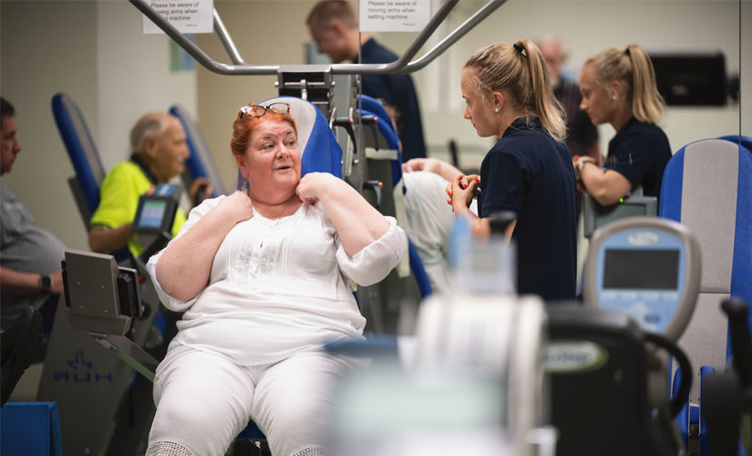 QUT student talking to patient