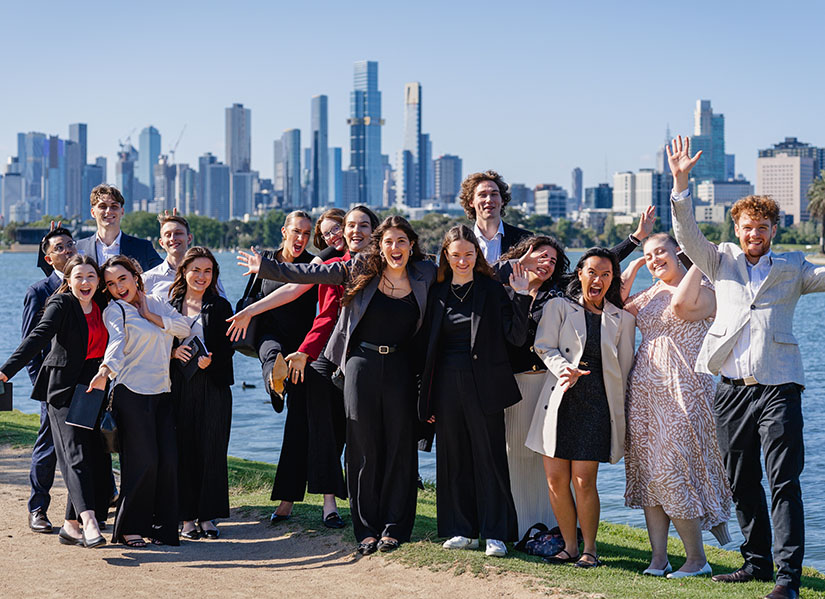 QUT Business School Students at Albert Park, with Melbourne CBD in background