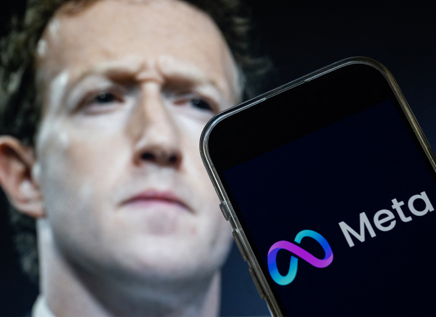 Mark Zuckerberg, CEO of Meta, and an image of the Meta logo.