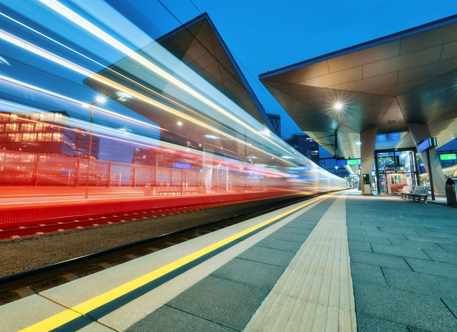 Train station with long exposure train going past