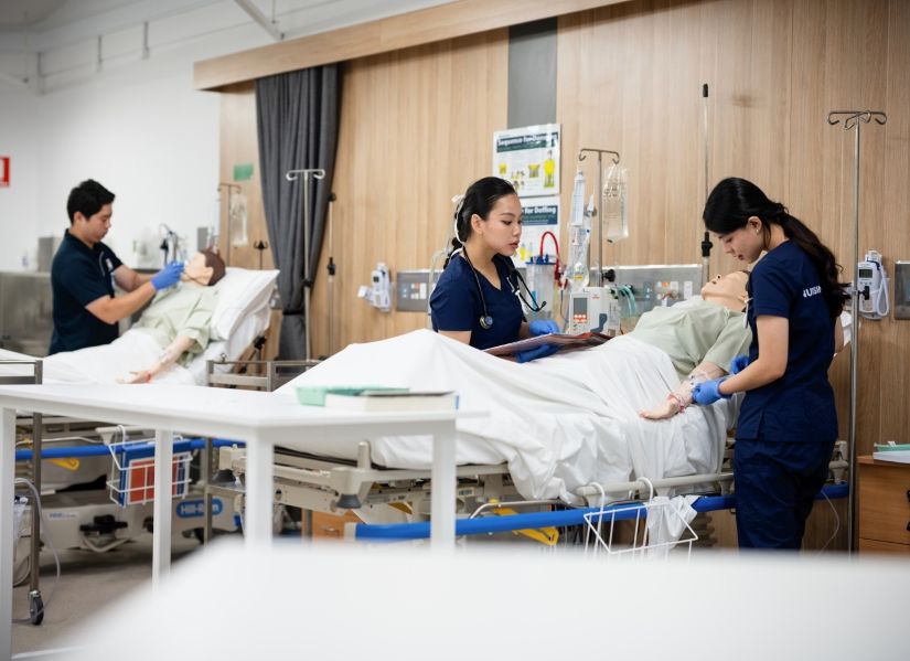 Sandra and Fiona practising in the QUT Clinical Simulation Centre